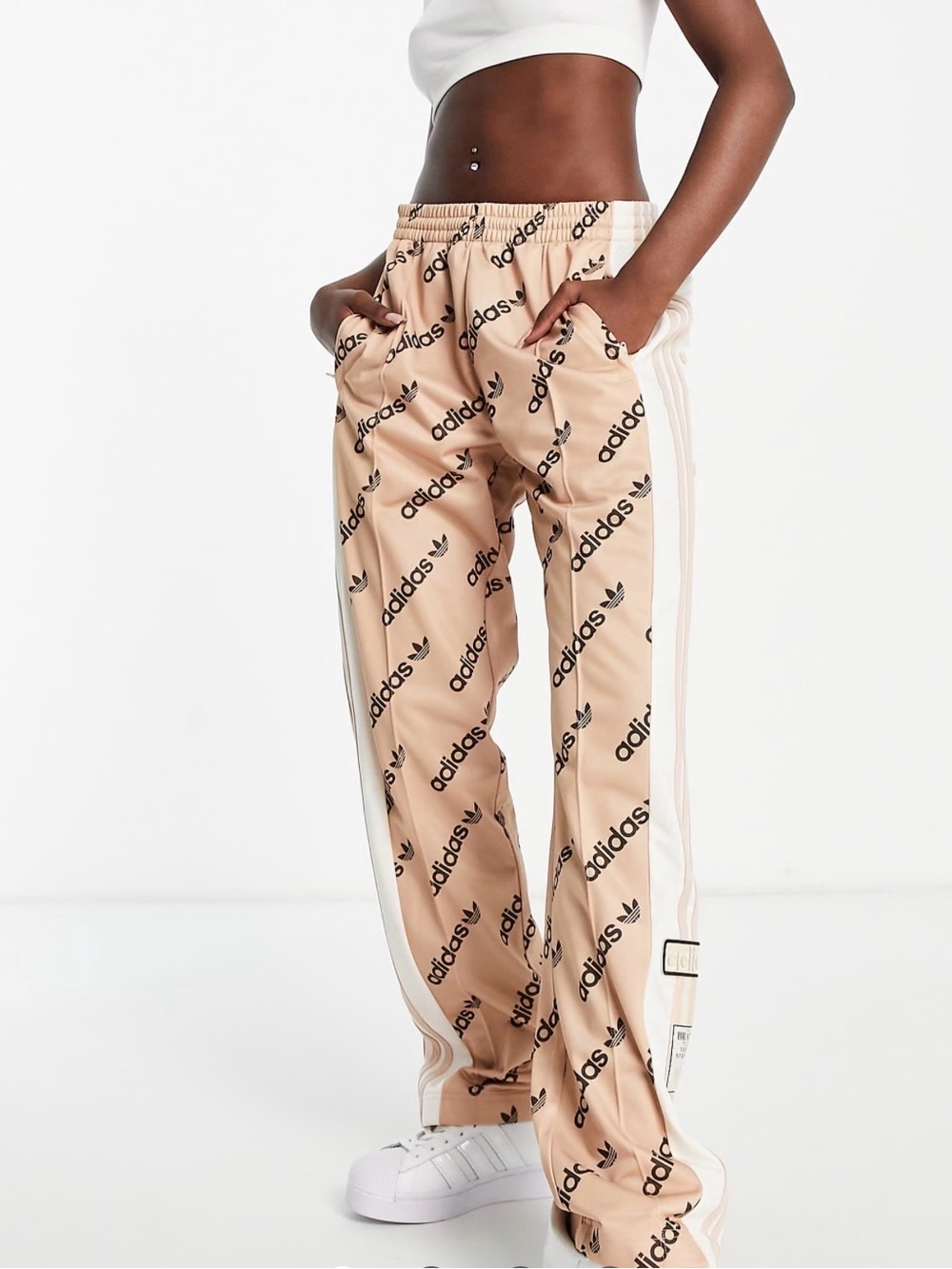 Adidas Originals ‘Logomania’ repeat logo adibreak side snaps trackpants in blush